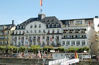  This is our hotel, seen while we were docking.  You can see the door to our room up behind the brick chimney on the 5th floor terrace.