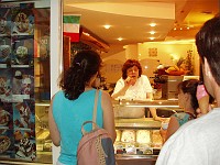  Back with Sandra and Carolyn speaking Italian with the woman at the Italian ice cream shop.