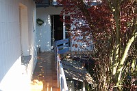  The walkway from the terrace to the kitchen, which is through that door.