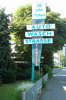  The sign in front of the house for the Müller's car wash.  It's been in the family for 70 years.