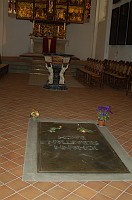  Bach's grave under the St. Paul Altar and the Baptismal Font (built in 1615).  Bach's remains were moved here in 1950 to commemorate the 200th anniversary of his death.