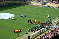  Spain (in red) and Ukraine (in yellow) enter the field.