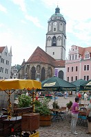  The Market Place by day with the Church of Our Lady (Frauenkirche) in the background.