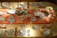  Looking down from the stairs at the elaborate table service.