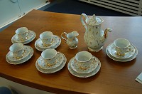  Lovely, isn't it?  Cups, plates, saucers, creamer and the coffee pot.  The only thing missing is the sugar bowl, which they had to send separately.