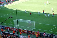  The Spanish team shoots, but the Saudi keeper makes the save.